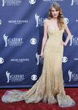 http://img217.imagevenue.com/loc987/th_65181_TaylorSwift_46thAnnualAcademyOfCountryMusicAwardsApril32011_By_oTTo191_122_987lo.jpg